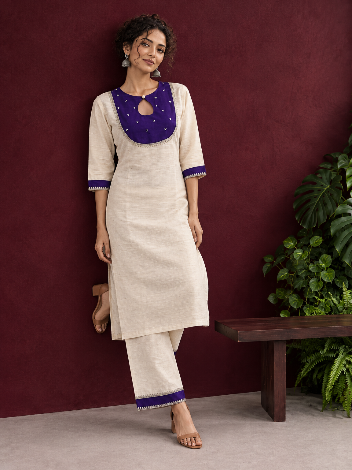 Elegant Off-White Silk Kurta with Contrast Purple Yoke Panel & Hand Embroidered Sequin Detailing — side view — view 4