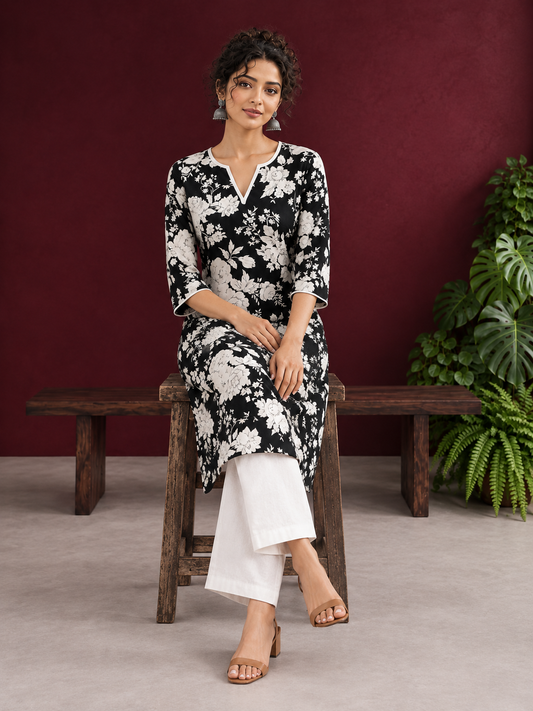 Classic Black Rayon Kurta with White Floral Print and Contrast Notched Neckline — seated