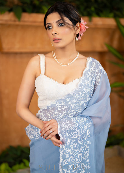 Elegant Powder Blue Organza Saree Highlighted With Overall Intricate Floral Embroidery