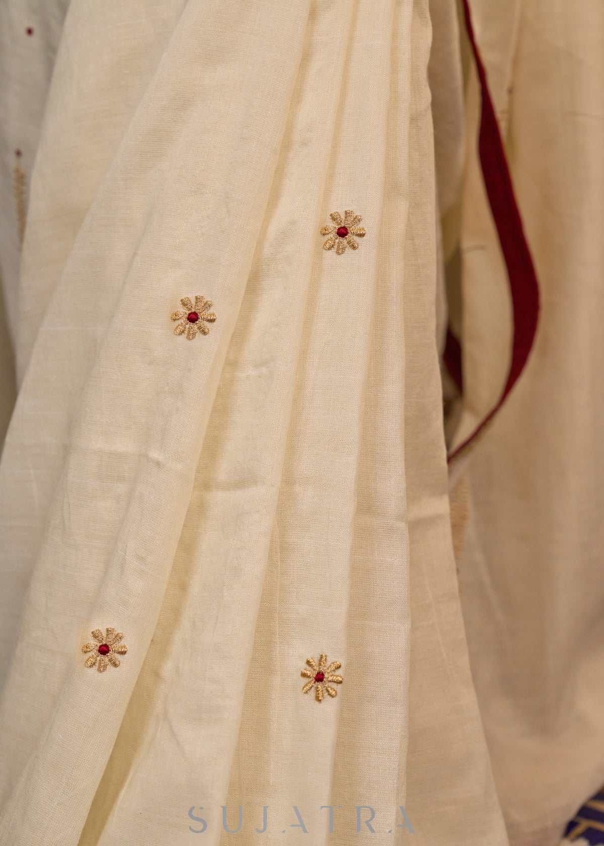Dussehra Sale — Graceful ivory cotton saree highlighted with beautiful overall intricate embroidery