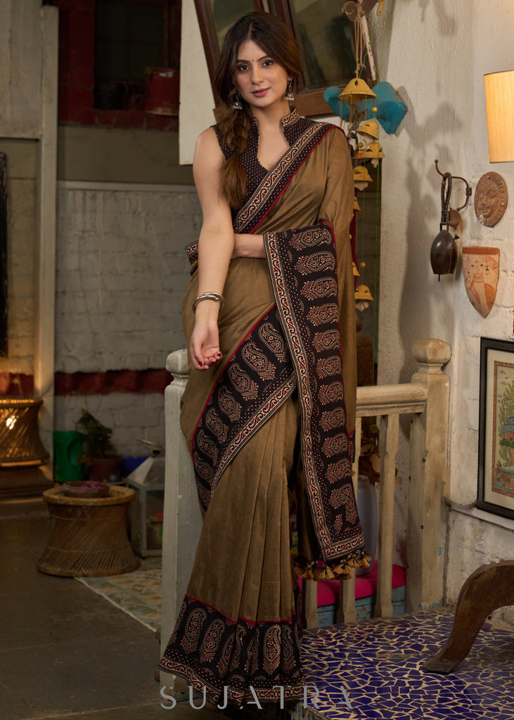 Gracious coffee brown cotton saree with ajrakh combination highlighted with side pocket