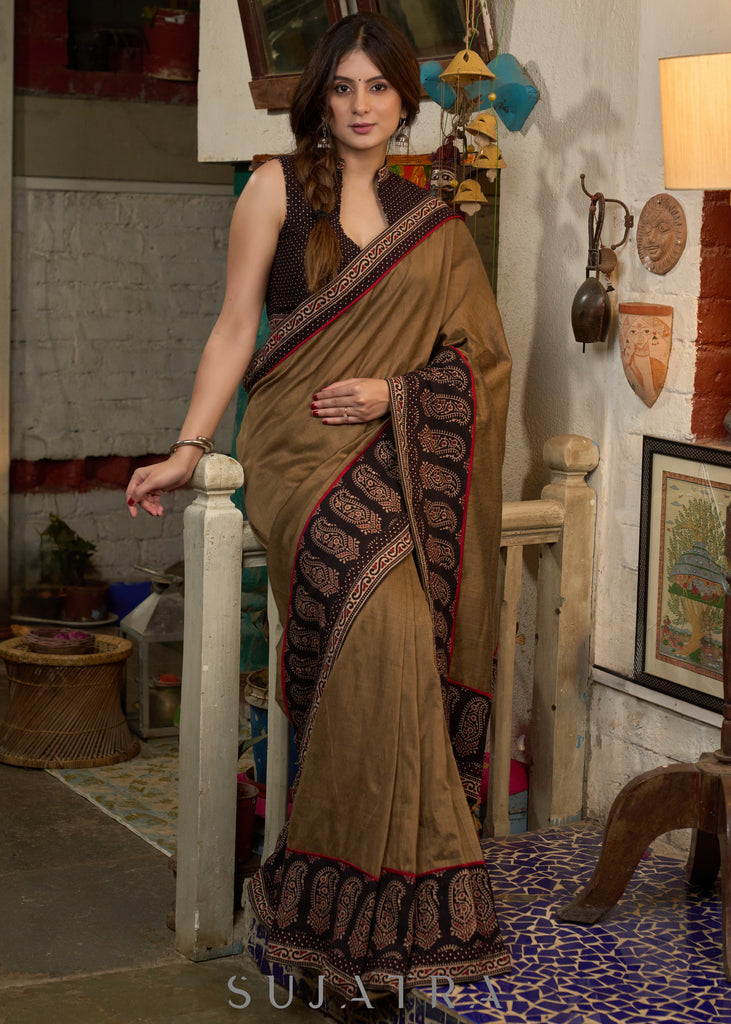 Gracious coffee brown cotton saree with ajrakh combination highlighted with side pocket
