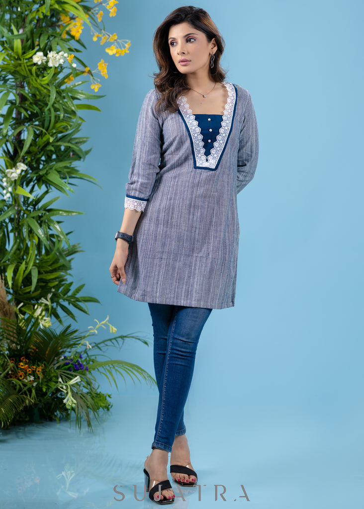 Stylish sky blue textured cotton tunic highlighted with beautiful lace