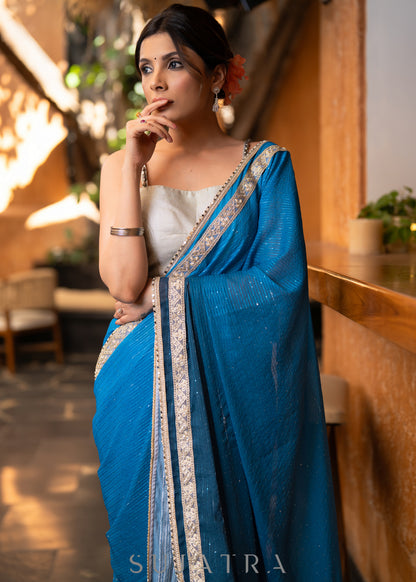 Trendy Teal Ombre Saree With Overall Sequence Highlighted With Beautiful Pearl Laces
