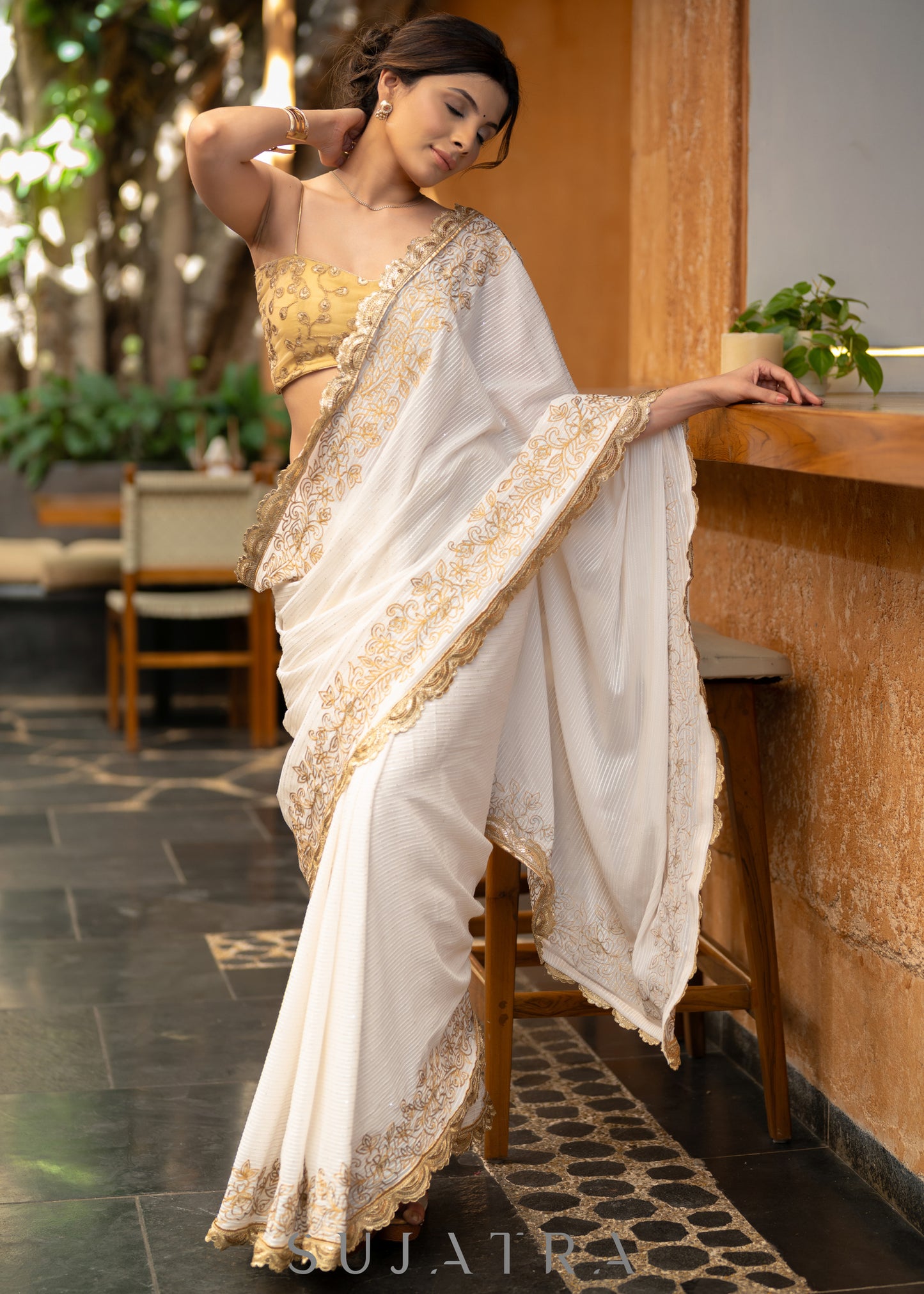 Subtle White Georgette Saree With Beautiful Sequenced Crochet Highlighted With Intricate Floral Embroidery And Scalloped Lace