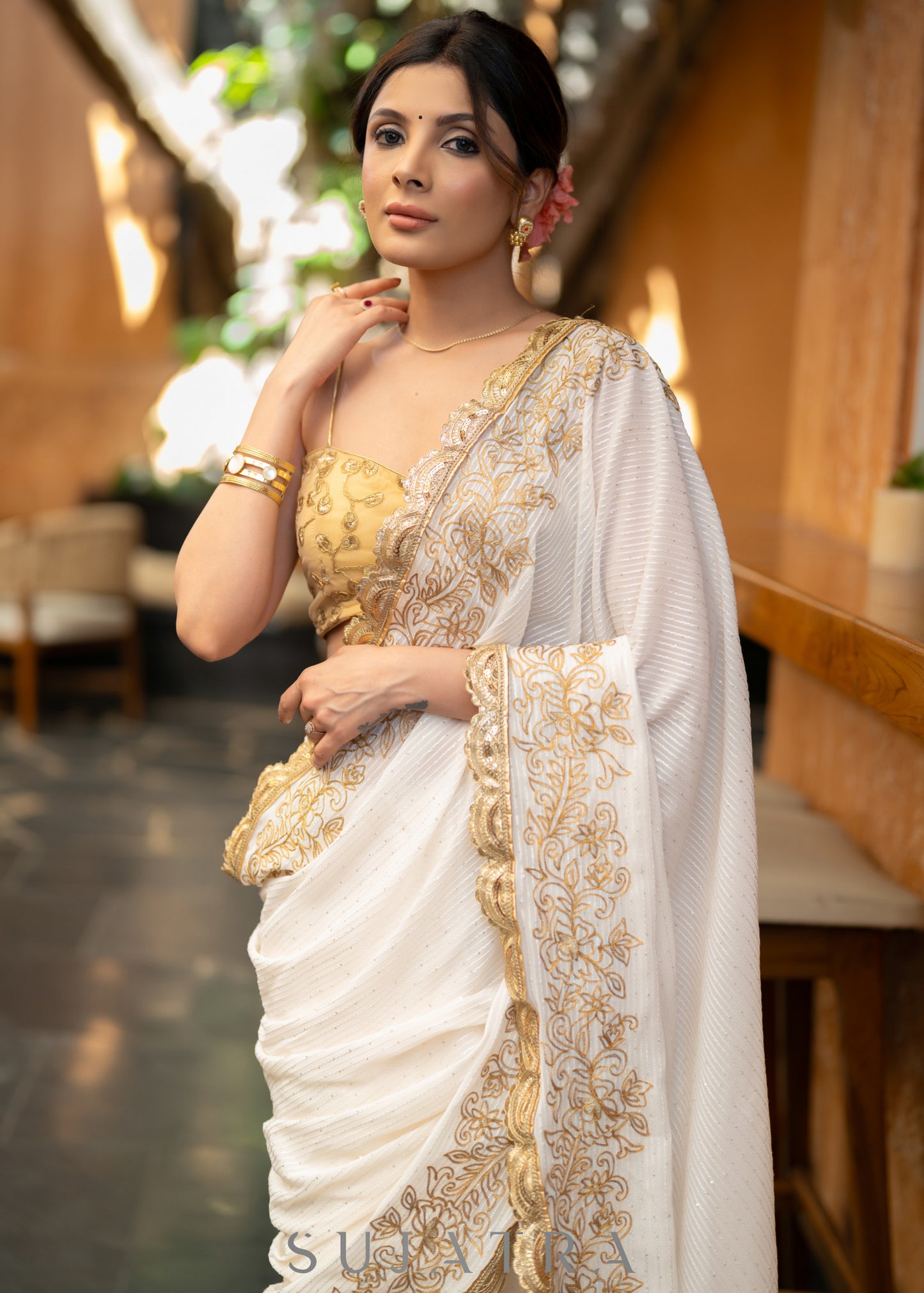 Subtle White Georgette Saree With Beautiful Sequenced Crochet Highlighted With Intricate Floral Embroidery And Scalloped Lace