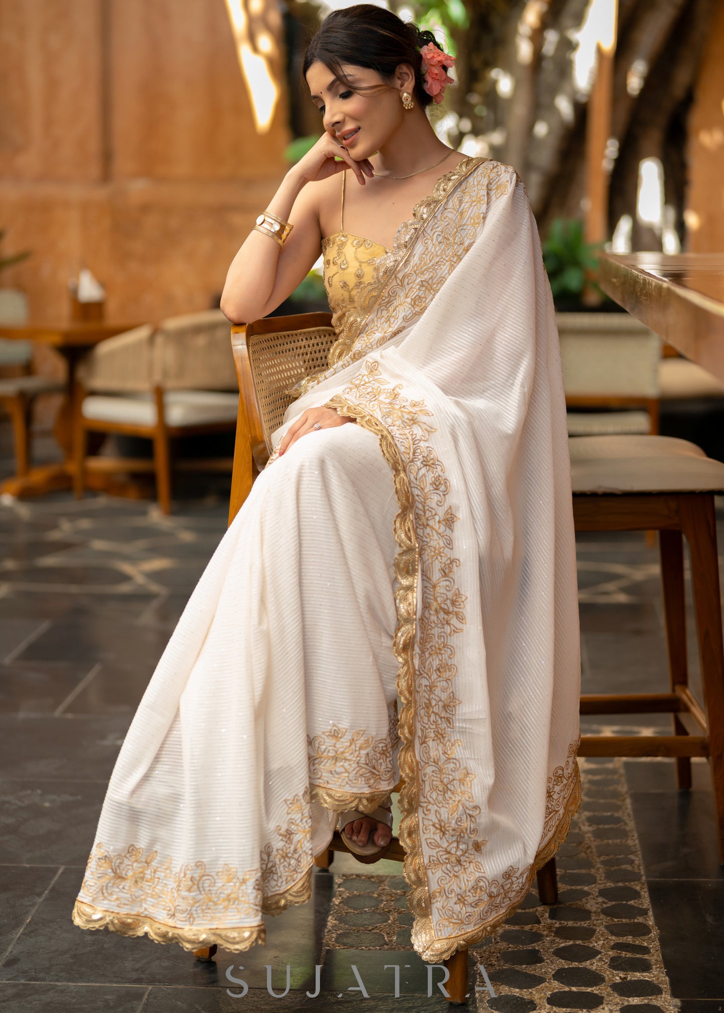 Subtle White Georgette Saree With Beautiful Sequenced Crochet Highlighted With Intricate Floral Embroidery And Scalloped Lace