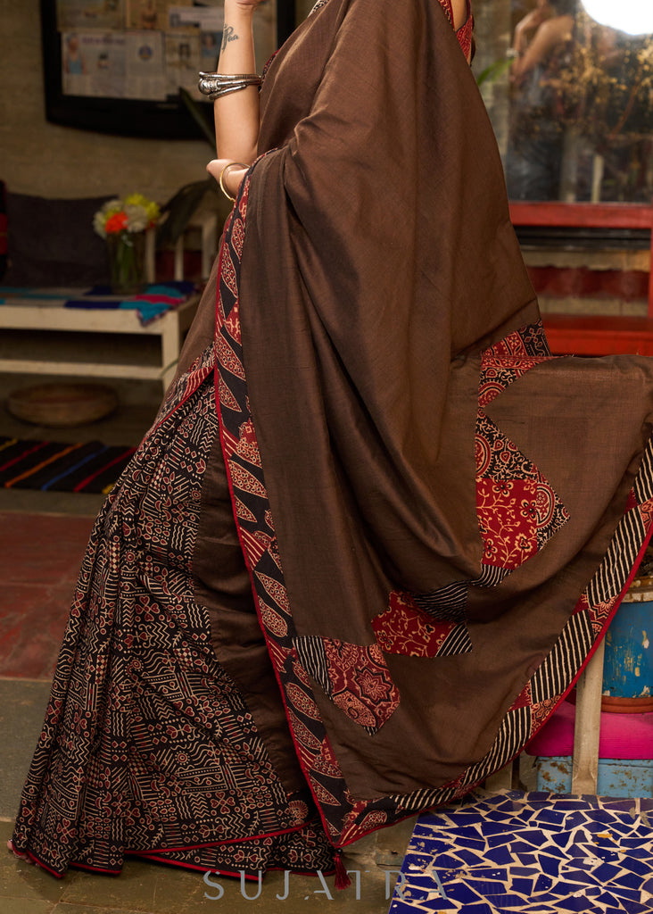 Exclusive brown cotton ajrakh combination saree highlighted with ajrakh patchwork