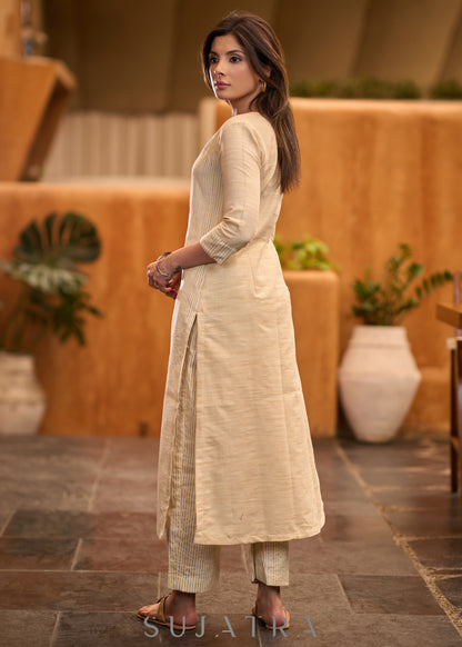 Elegant beige & striped princess cut kurta with metalic buttons -  Pant optional