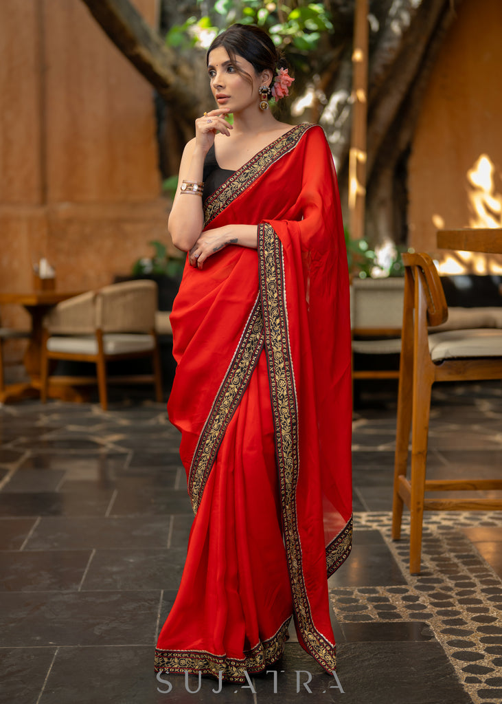 Classy Red Organza Saree Highlighted with Beautiful Embroidered Border.