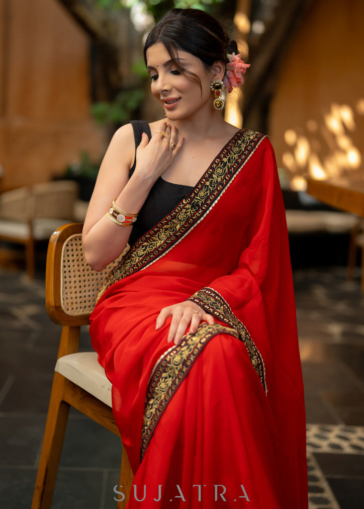 Classy Red Organza Saree Highlighted with Beautiful Embroidered Border.