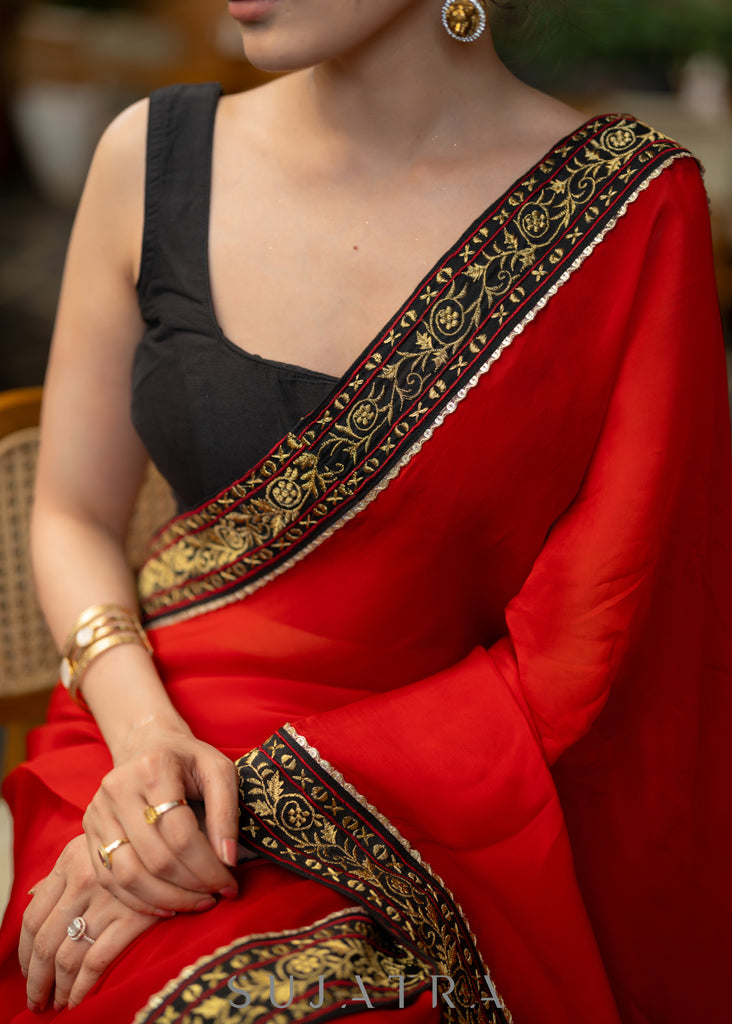 Classy Red Organza Saree Highlighted with Beautiful Embroidered Border.