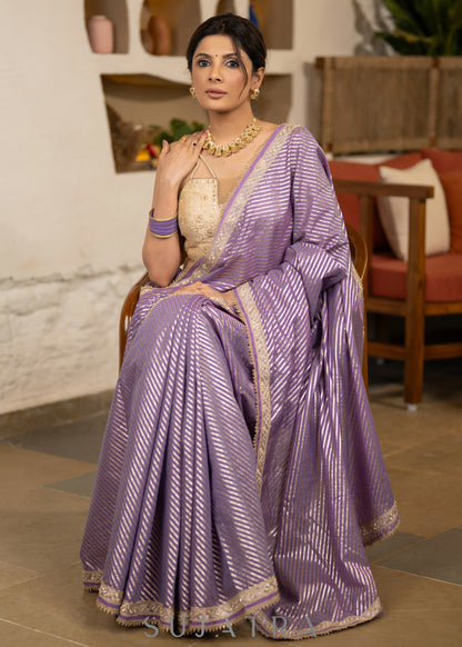 Gracious Lilac Striped Banarasi Saree Highlighted With Pearl Lace
