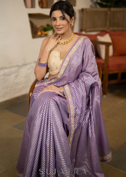 Gracious Lilac Striped Banarasi Saree Highlighted With Pearl Lace