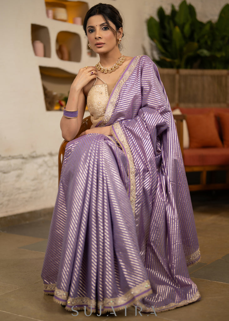 Gracious Lilac Striped Banarasi Saree Highlighted With Pearl Lace