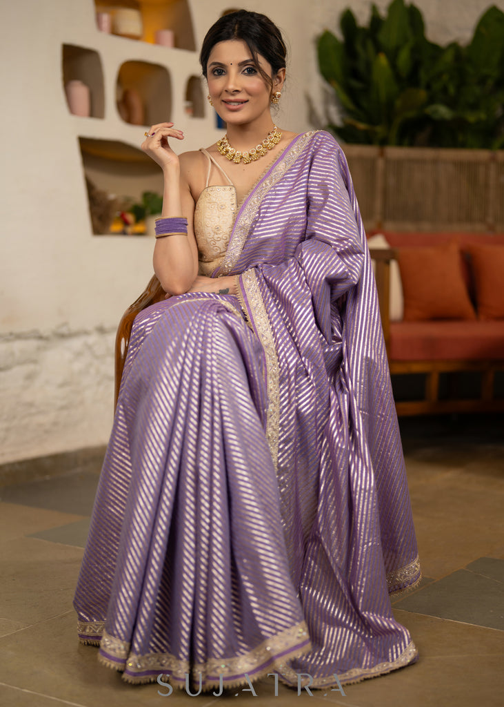 Gracious Lilac Striped Banarasi Saree Highlighted With Pearl Lace