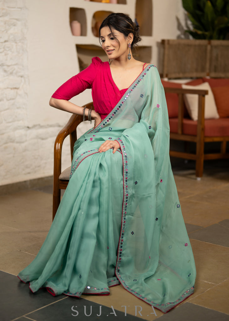 Designer Mint Green Organza Saree Highlighted With Overall Multicolour Mirror Embroidery