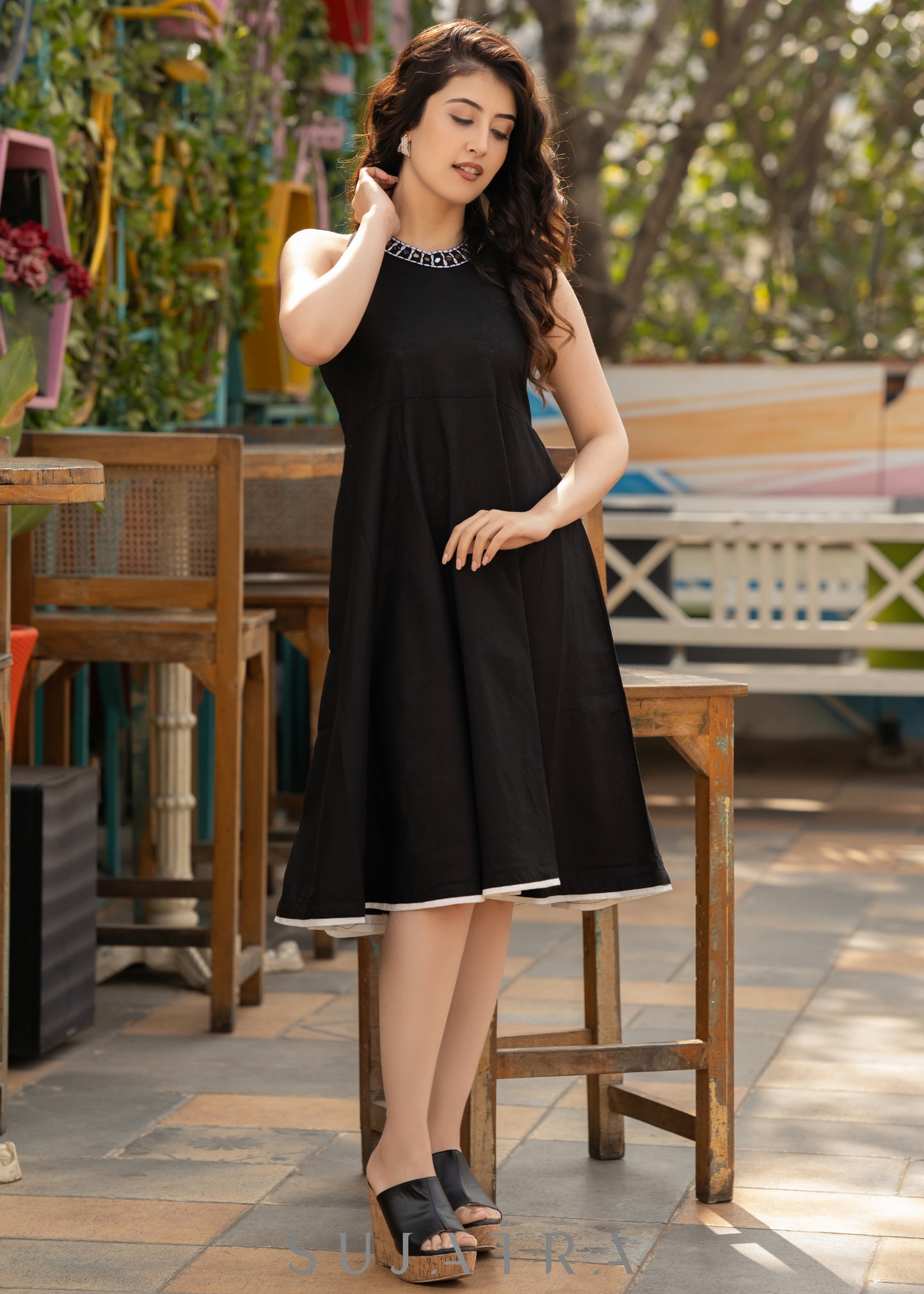 Elegant black cotton halter neck dress with embroidered neckline