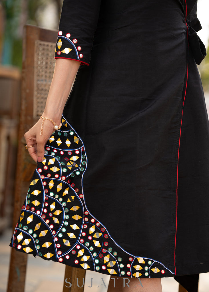 Black cotton dress with hand embroidered mirror work on sides
