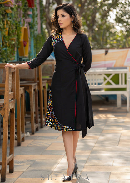 Black cotton dress with hand embroidered mirror work on sides