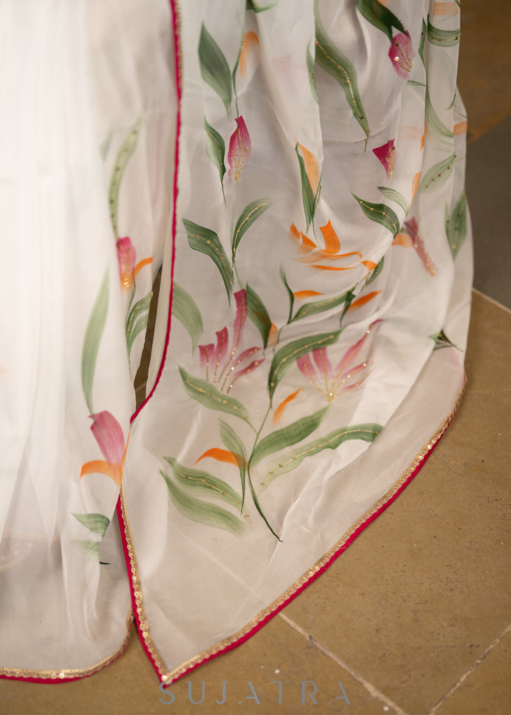 Trendy White Organza Saree With Overall floral Brush Painting Highlighted With Minimal Hand Embroidery