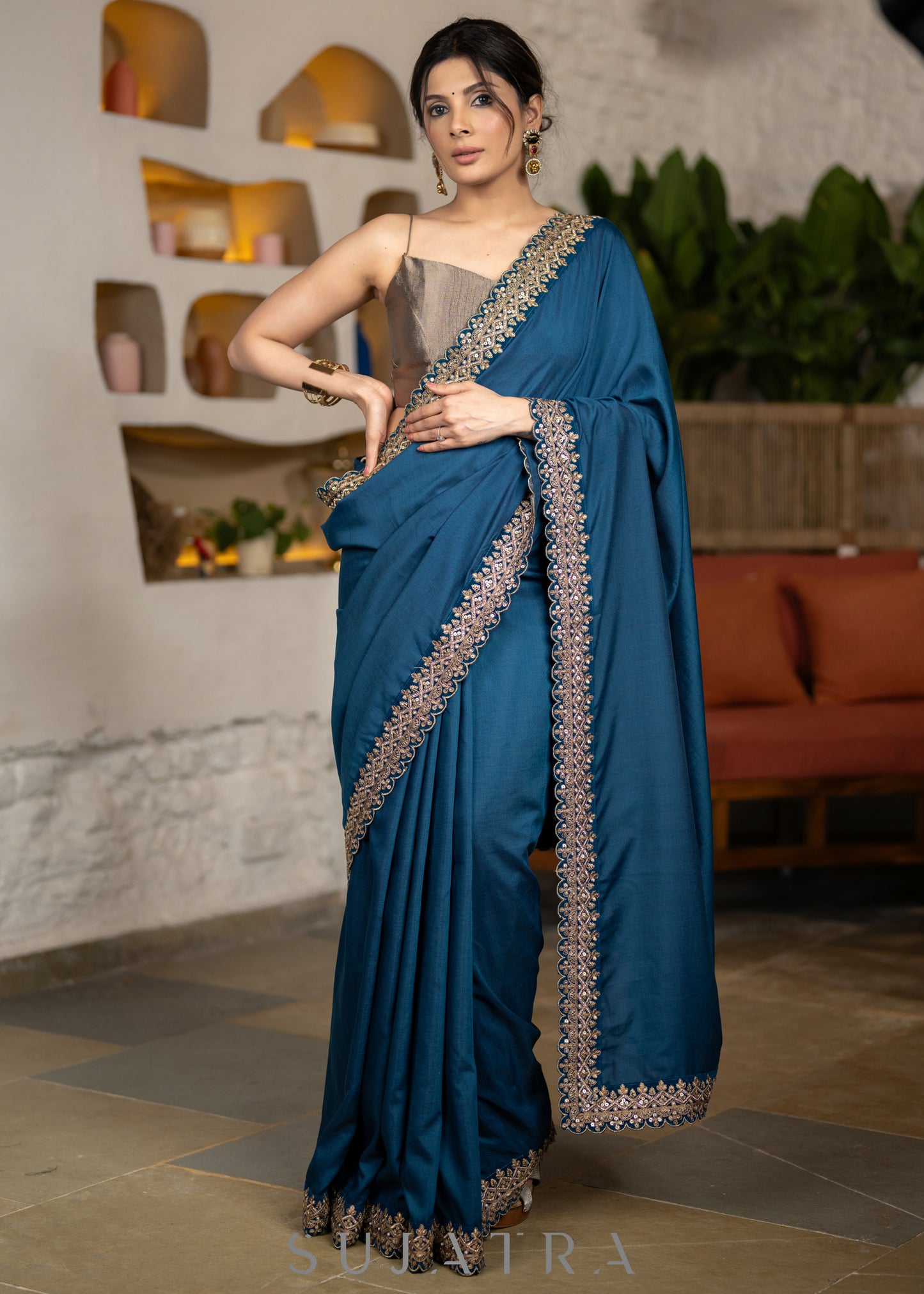 Lustrous Teal Muslin Saree Highlighted With Beautiful Matching Lace