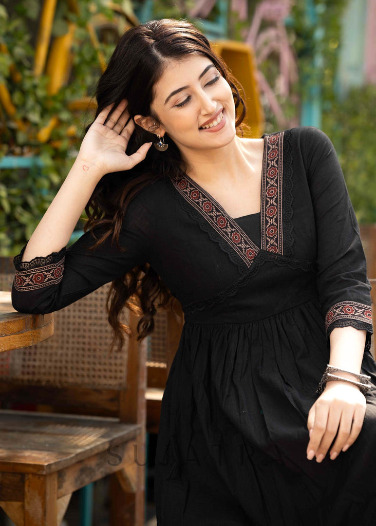 Black cotton dress with Ajrakh border in neckline & sleeves