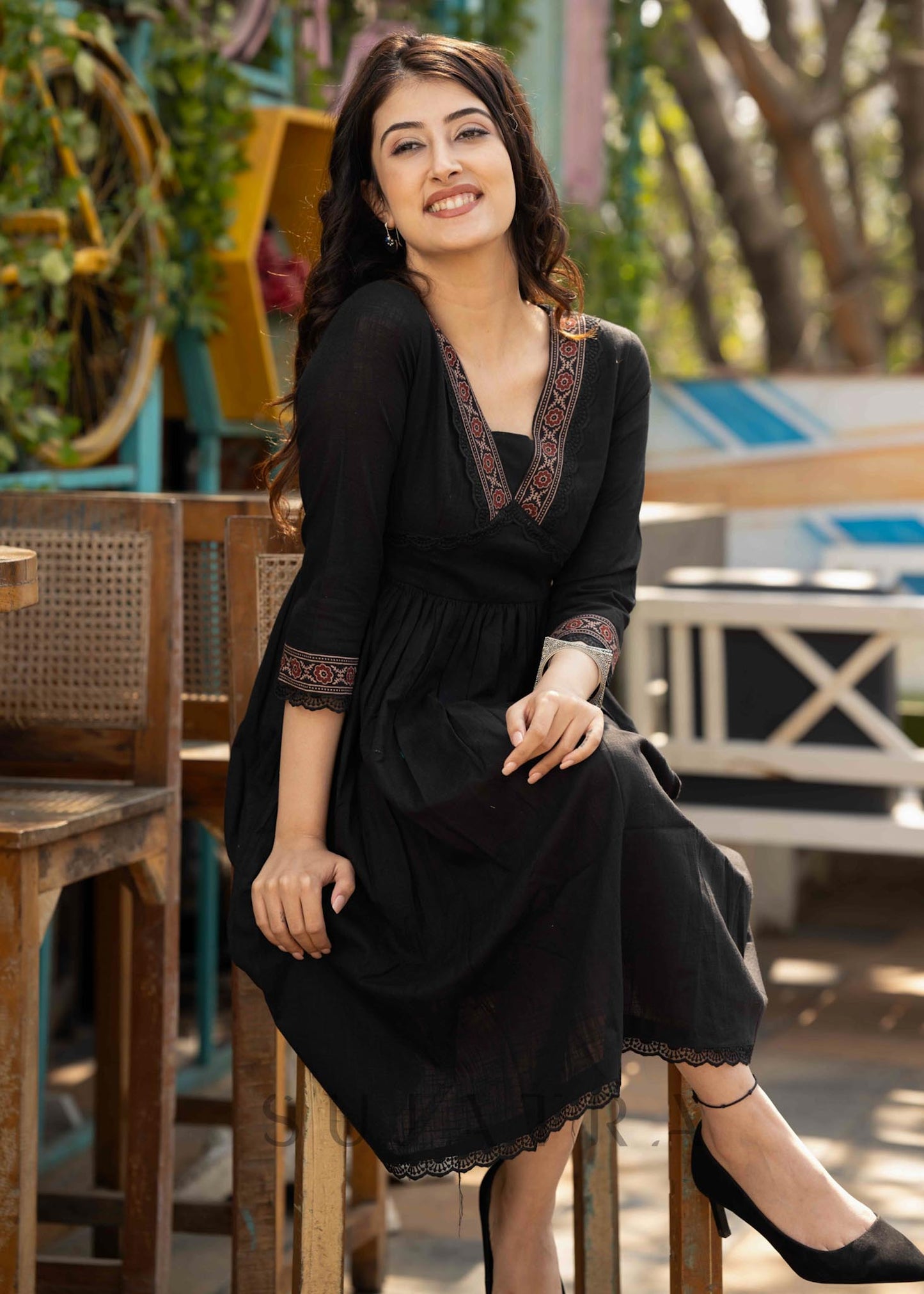 Black cotton dress with Ajrakh border in neckline & sleeves