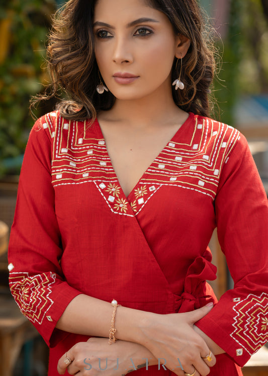 Beautiful red cotton overlap dress highlighted with intricate embroidery