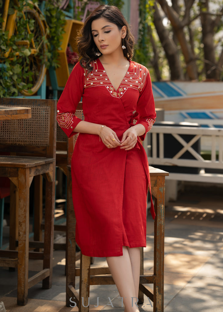 Beautiful red cotton overlap dress highlighted with intricate embroidery