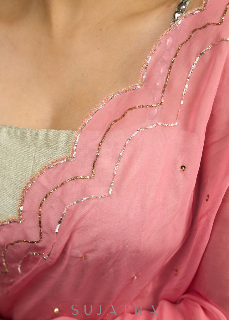 Stylish french pink organza saree with overall pitta embroidery