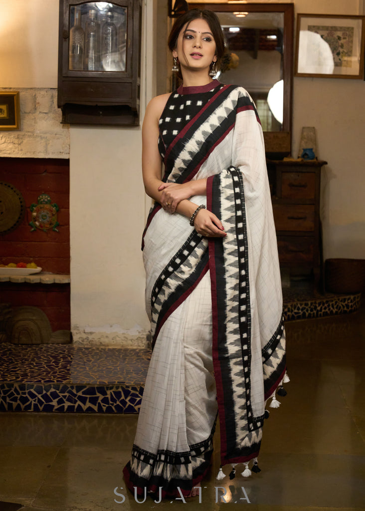 Stylish white cotton saree with ikat combination