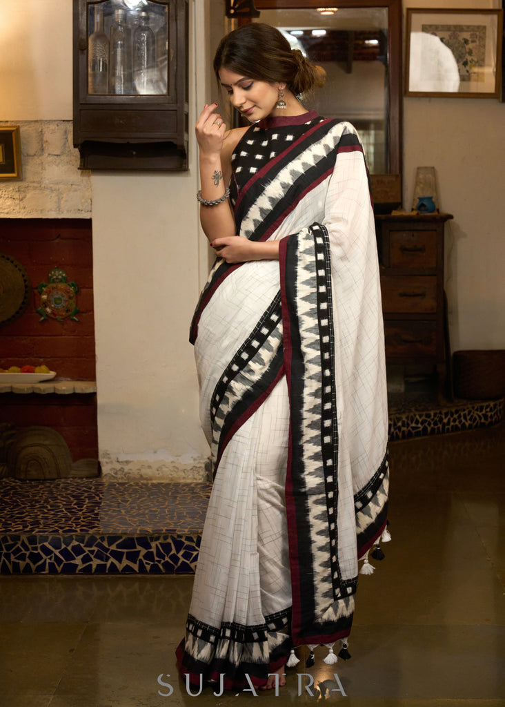 Stylish white cotton saree with ikat combination