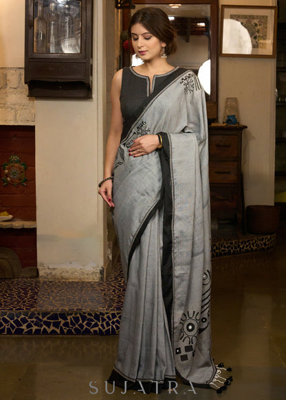 Graceful grey cotton saree with beautiful abstract hand painting highlighted with contrast painted side pocket