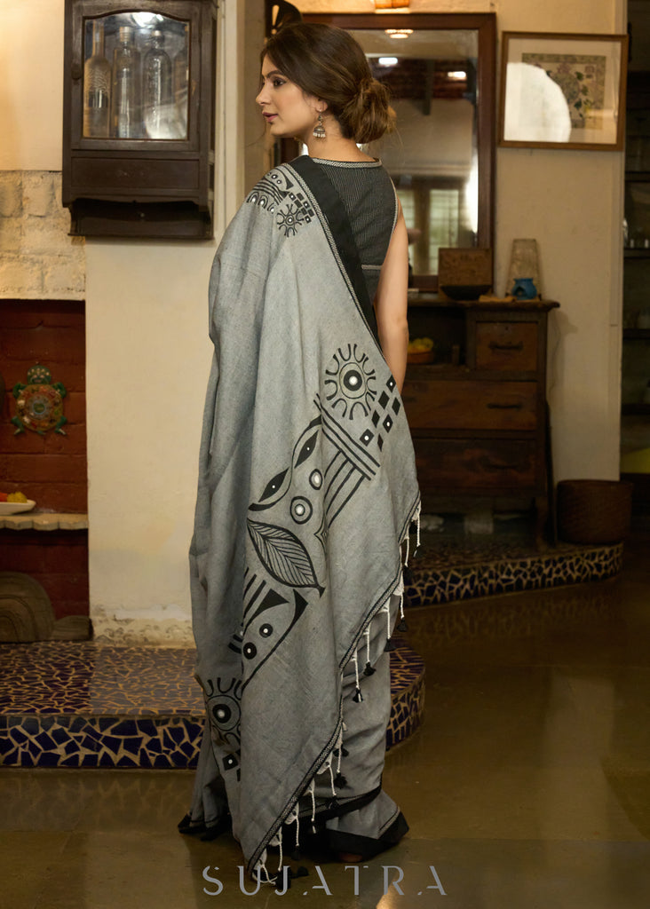 Graceful grey cotton saree with beautiful abstract hand painting highlighted with contrast painted side pocket