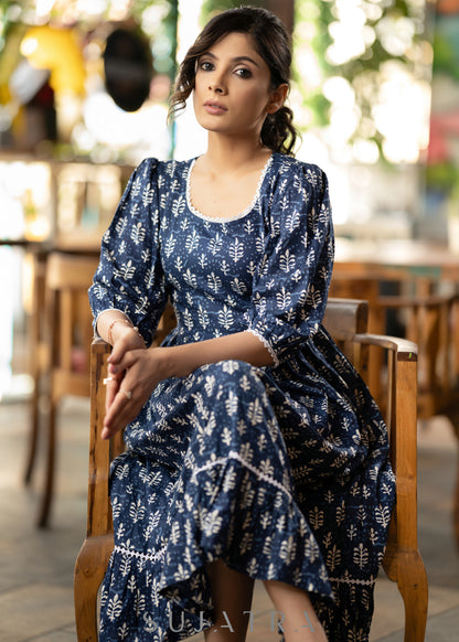 Trendy navy blue floral printed rayon gathered dress highlighted with beautiful lace