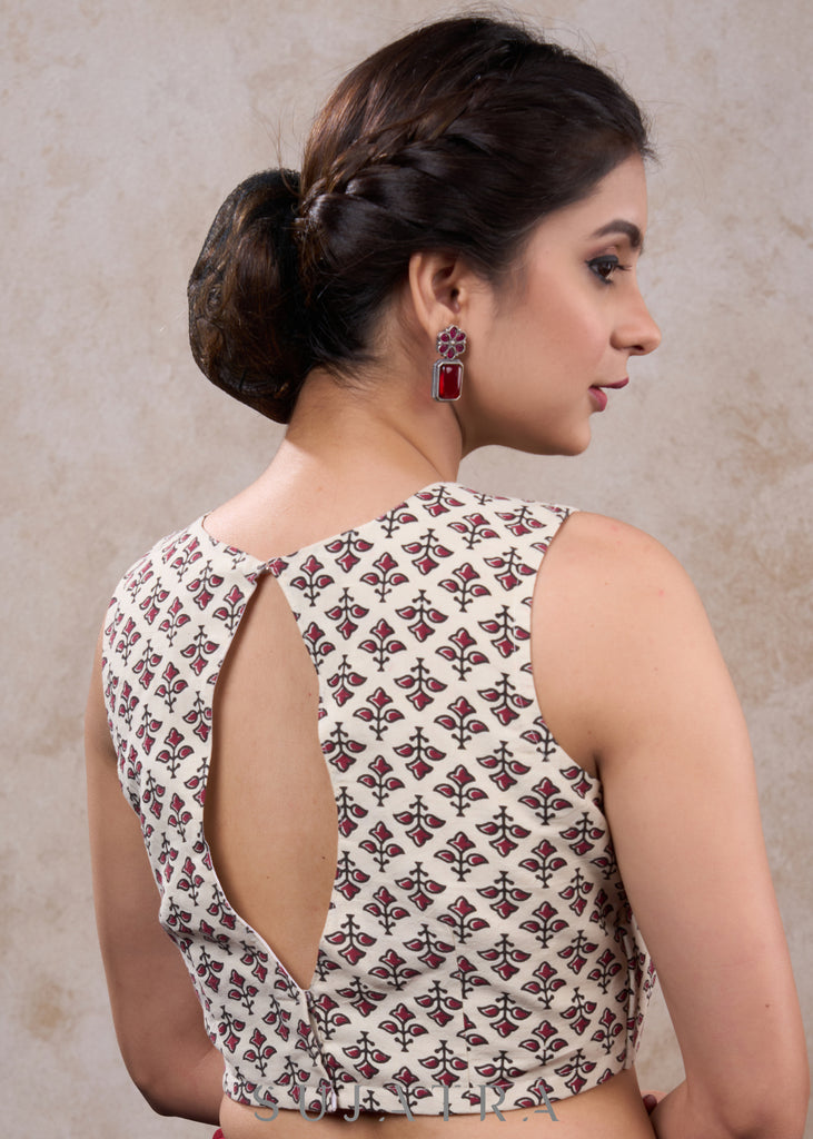 Classy white printed cotton sleeveless blouse