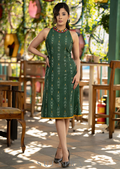 Smart green cotton ikat halter neck dress with beautiful kutch lace on the neckline