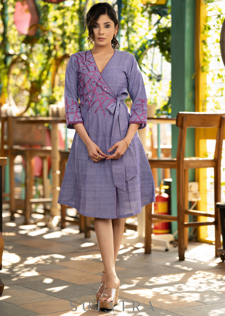 Elegant lilac cotton overlap dress highlighted with contrast embroidery