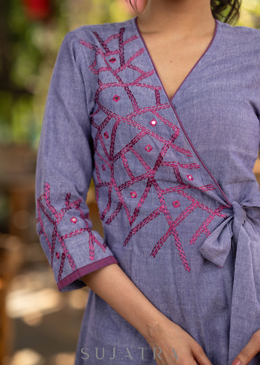Elegant lilac cotton overlap dress highlighted with contrast embroidery