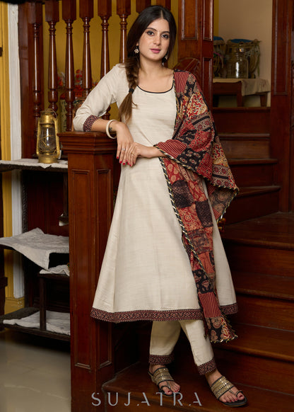 Off-white handloom kurta with contrast ajrakh highlights, paired with complementing pants - Patch work stole Optional