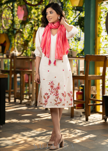 Beautiful ivory cotton dress with floral embroidery paired with matching shibori stole