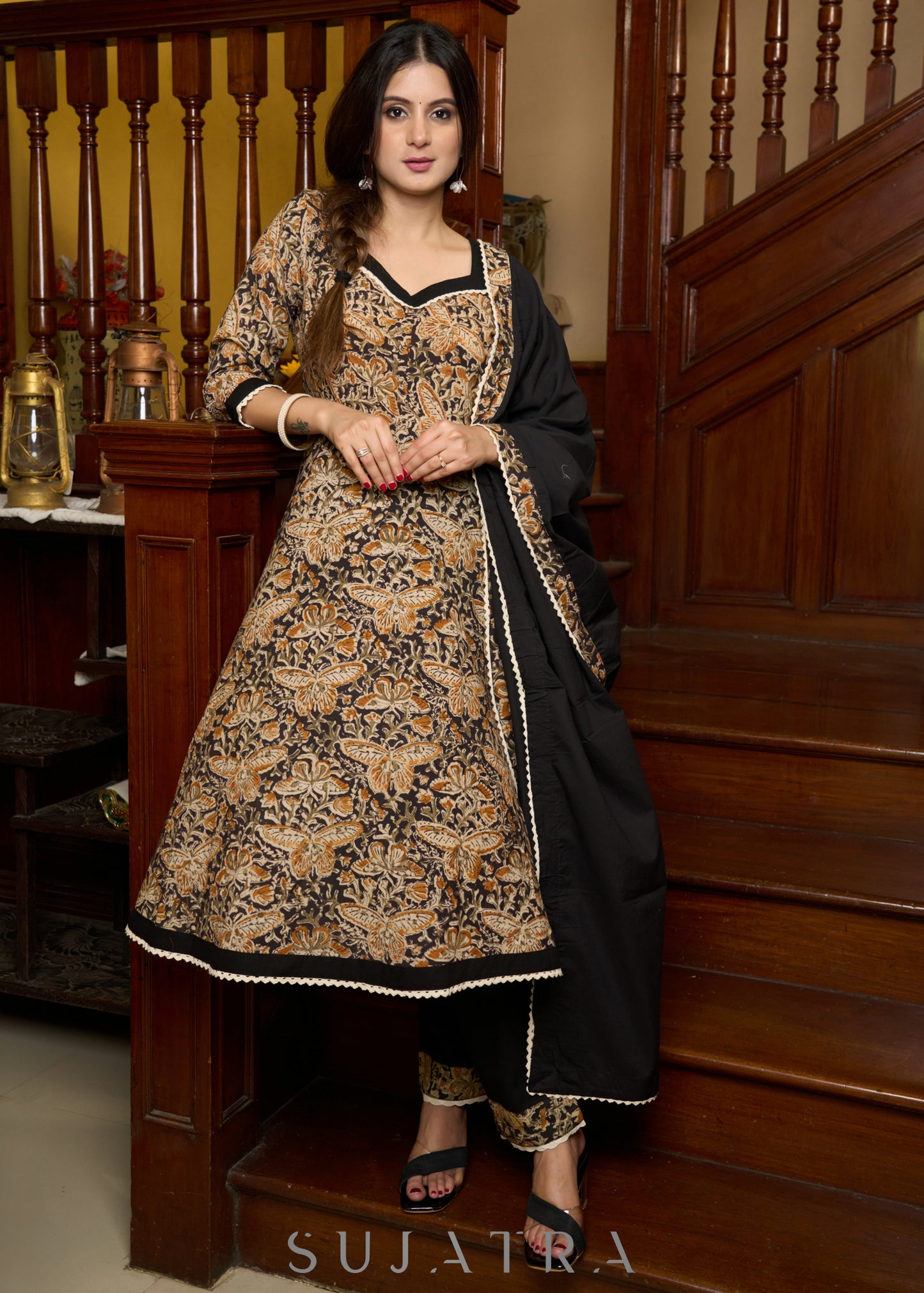 Black Kalamkari anarkali kurta with delicate lace highlights