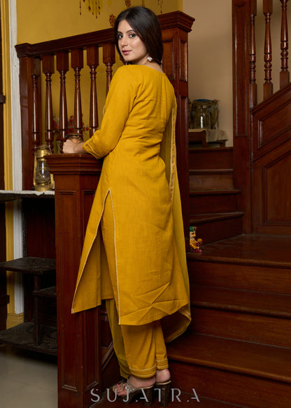Graceful delicate mustard cotton kurta with a lace yoke and matching pants - Dupatta Optional