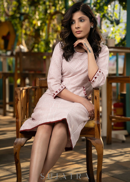 Beautiful Off-white striped cotton dress with mirror work detailing