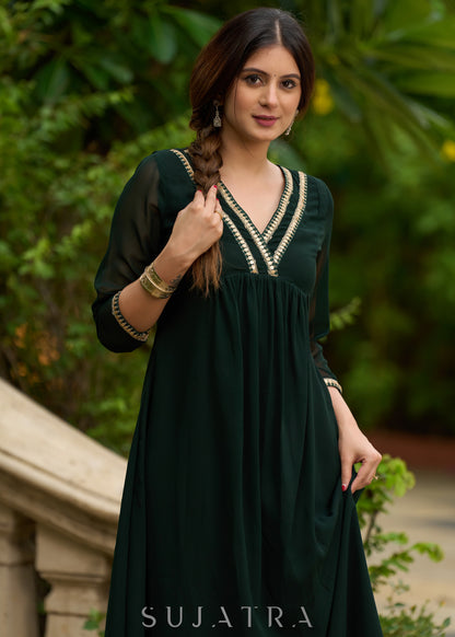 Elegance redefined in this captivating green georgette lace kurta -  Pant additional