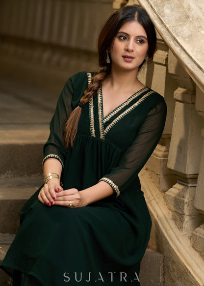 Elegance redefined in this captivating green georgette lace kurta -  Pant additional
