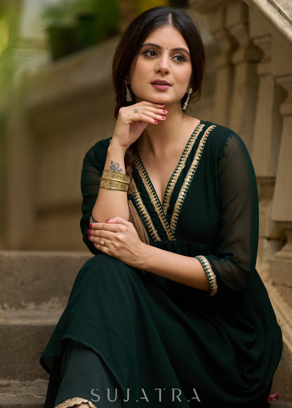 Elegance redefined in this captivating green georgette lace kurta -  Pant additional