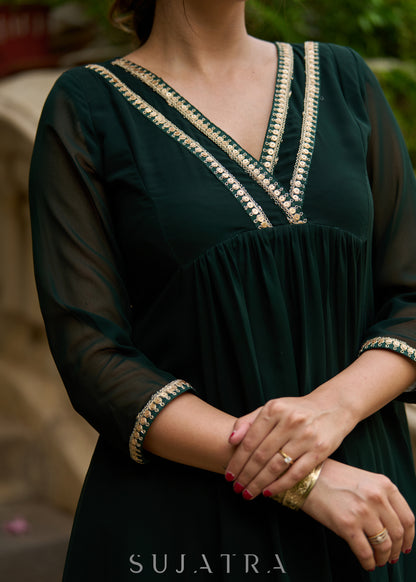 Elegance redefined in this captivating green georgette lace kurta -  Pant additional