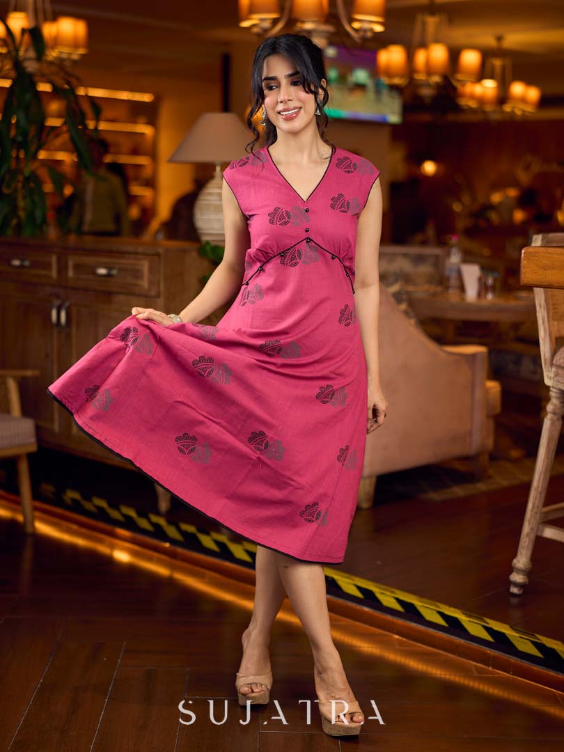 Rich wine drop-shoulder dress with black and grey hand block printed floral motifs, a softly gathered yoke, black pearl embellishments, and bold black accents for a striking artisanal look.